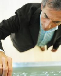 A teacher at the blackboard